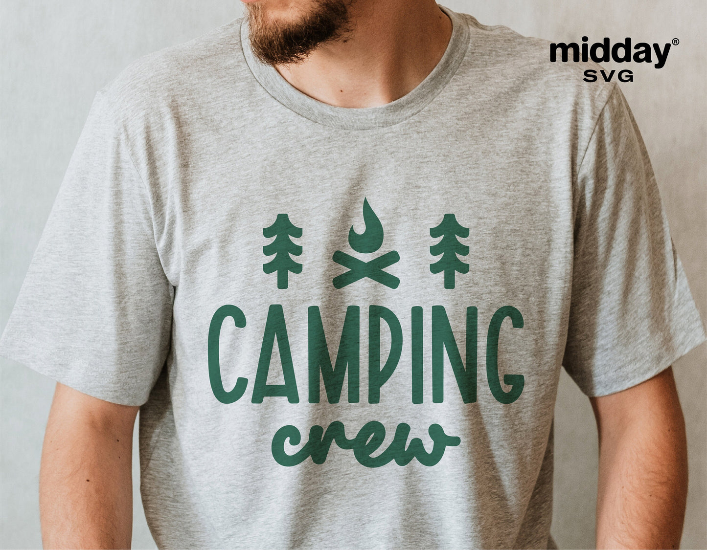 Gray t-shirt with green 'Camping Crew' design, featuring trees and a campfire icon, ideal for camping enthusiasts and outdoor activities.
