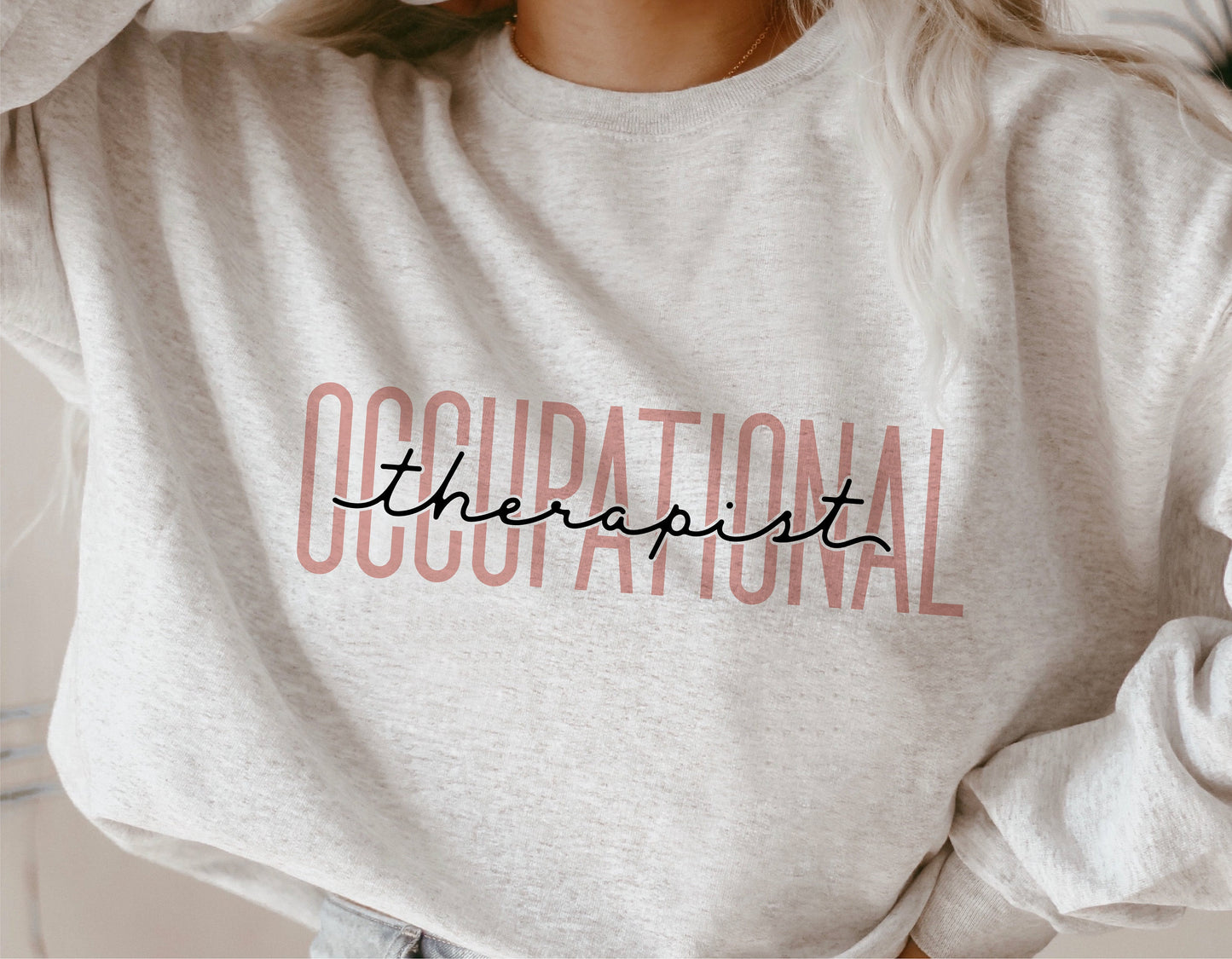 Gray sweatshirt with 'Occupational Therapist' text designed for occupational therapy enthusiasts.