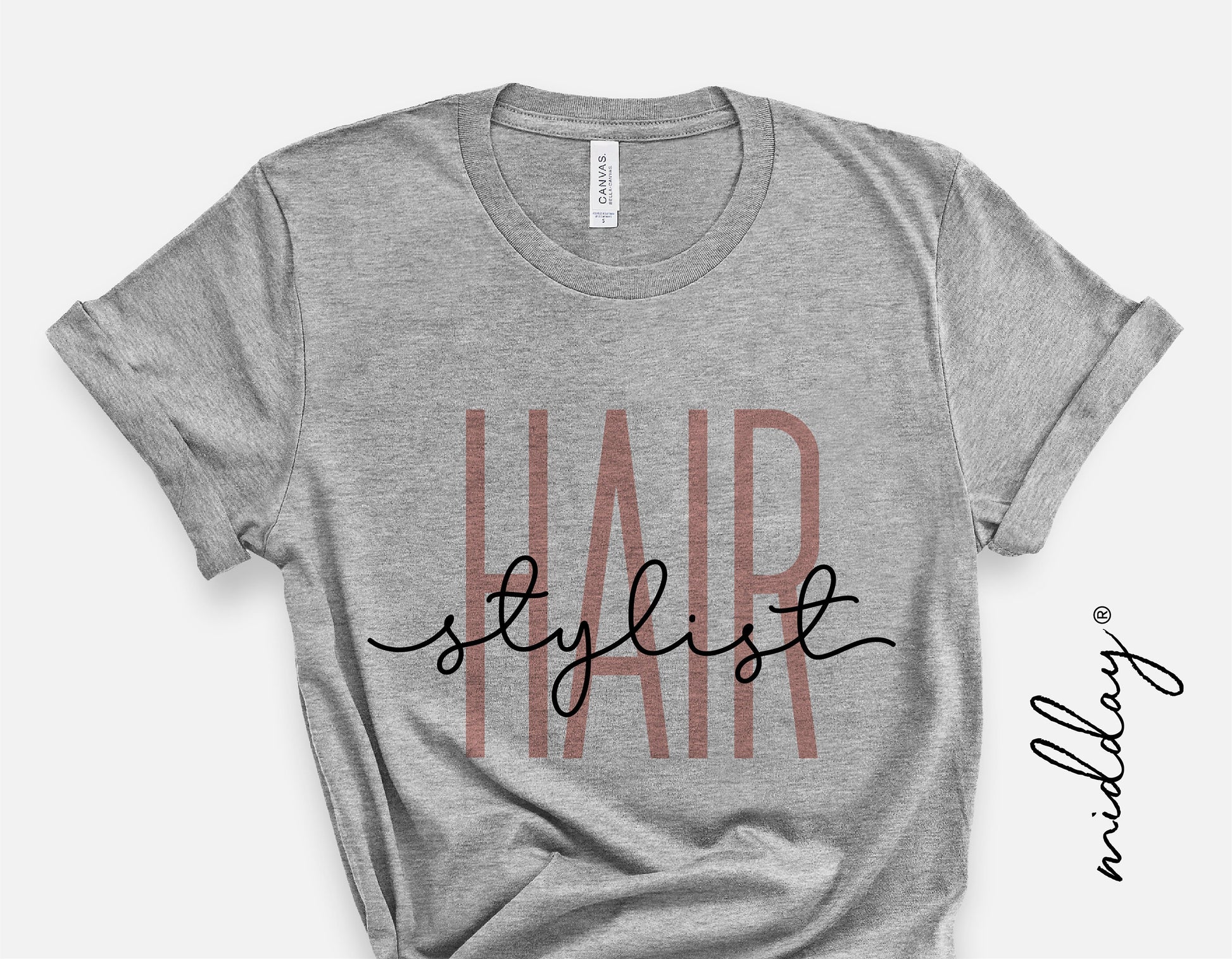 Gray t-shirt featuring 'HAIR stylist' text design, perfect for hair stylists. Ideal for Cricut and Silhouette crafts.