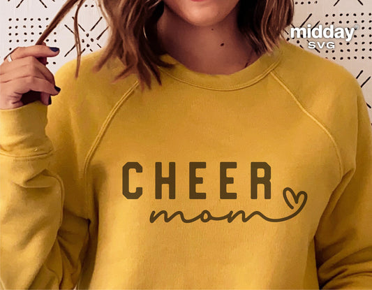 Yellow sweatshirt with 'Cheer Mom' and heart design, suitable for Cricut and Silhouette crafts. Perfect for cheer team supporters.