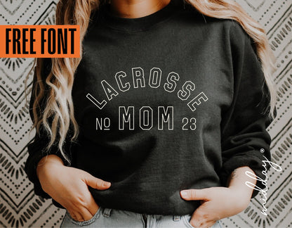 Woman wearing Lacrosse Mom sweatshirt with free font design, ideal for Cricut and Silhouette projects, digital download available.