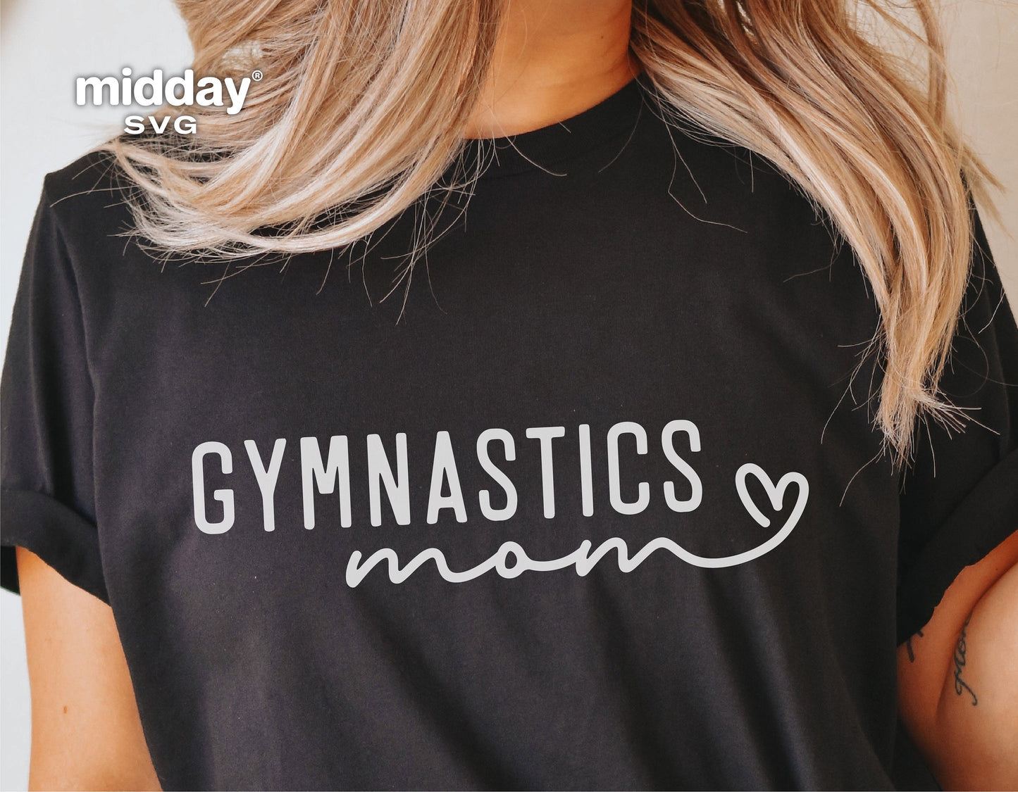Black t-shirt with 'Gymnastics Mom' design in white, featuring a heart, ideal for Cricut and Silhouette projects.