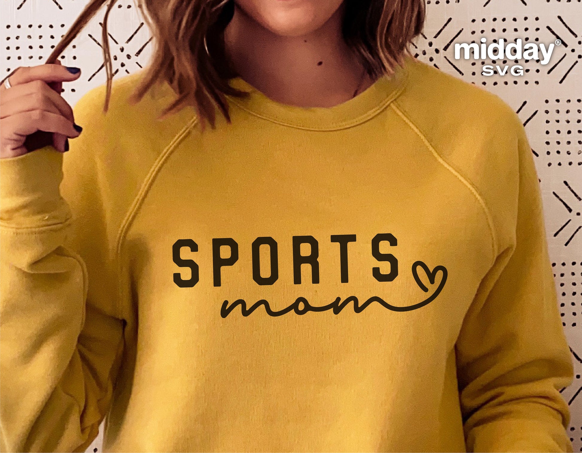 Yellow sweatshirt with 'Sports Mom' design in black, ideal for Cricut or Silhouette projects, perfect for sports moms.