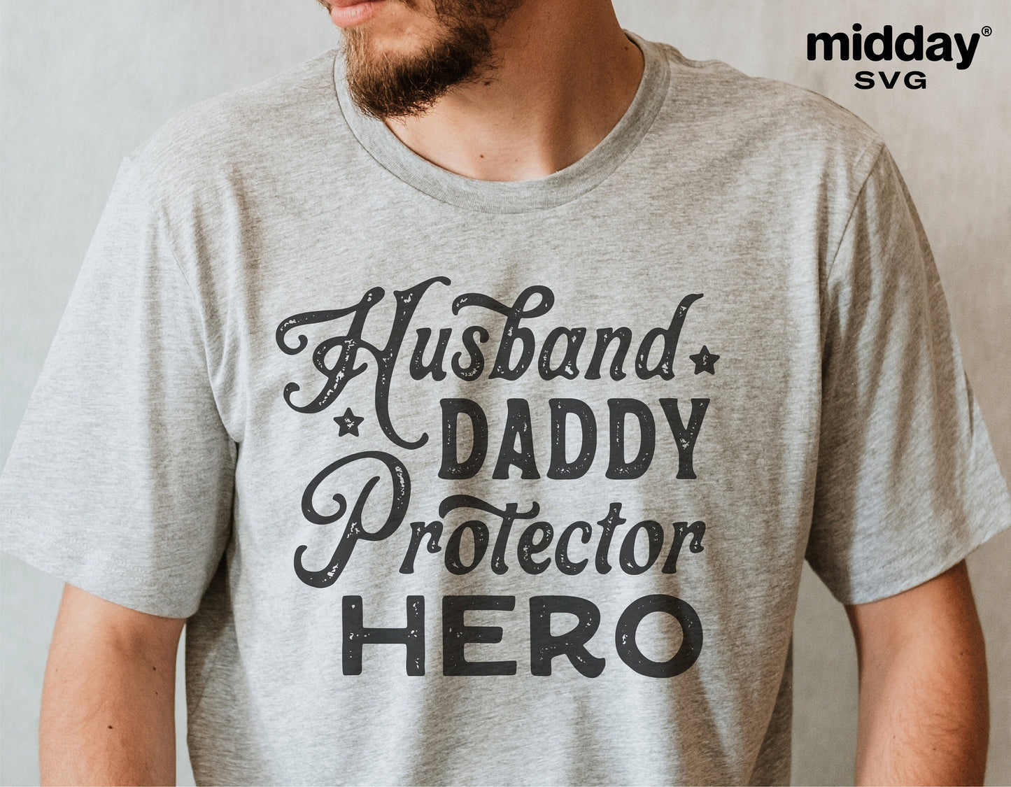 Man wearing a gray T-shirt with 'Husband Daddy Protector Hero' text, ideal for Father's Day gifts and Cricut crafting projects.