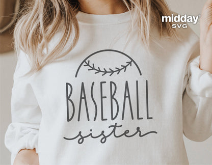Woman wearing a Baseball Sister sweatshirt with stylish baseball design, perfect for Cricut and Silhouette crafting projects.