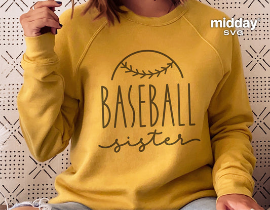 Woman wearing yellow sweatshirt with 'Baseball Sister' design, ideal for Cricut or Silhouette crafting projects.