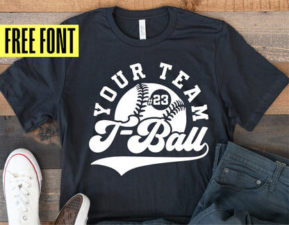 Black T-Ball Mom shirt with customizable team design, placed next to casual sneakers and jeans on a wooden floor