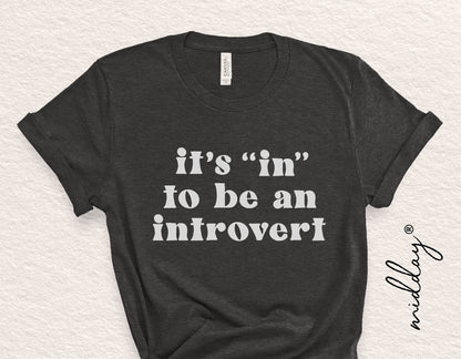 Black t-shirt with 'It's In To Be an Introvert' text design, funny sarcastic quote for introverts, Cricut and Silhouette cut file.