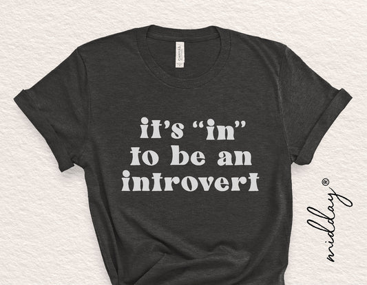 Black t-shirt with 'It's In To Be an Introvert' text design, funny sarcastic quote for introverts, Cricut and Silhouette cut file.