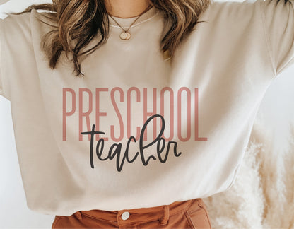 Woman wearing beige sweatshirt with 'Preschool Teacher' design, perfect for teacher gifts, Teacher Appreciation, and Cricut projects.