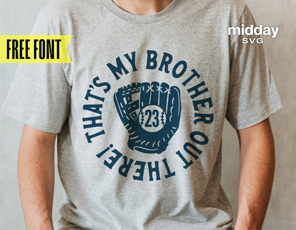 Gray t-shirt with 'That's My Brother Out There' and baseball glove graphic, suitable for Cricut and Silhouette projects.