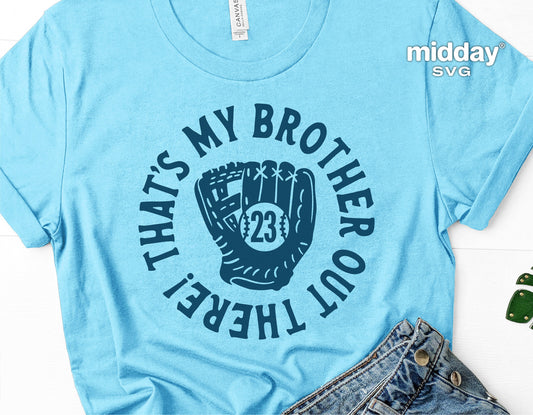 Blue t-shirt with "That's My Brother Out There" and a baseball glove graphic, ideal for baseball sibling support and Cricut crafting.