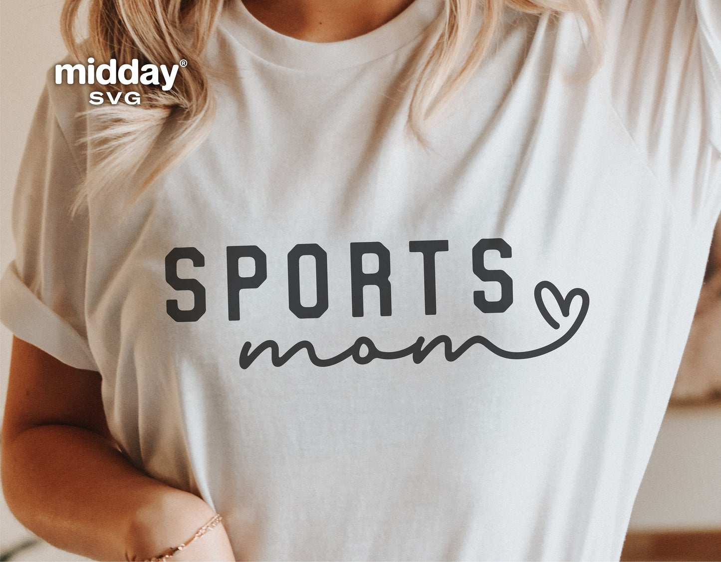 Woman wearing t-shirt with 'Sports Mom' design, perfect for Cricut and Silhouette projects, available as a digital download.