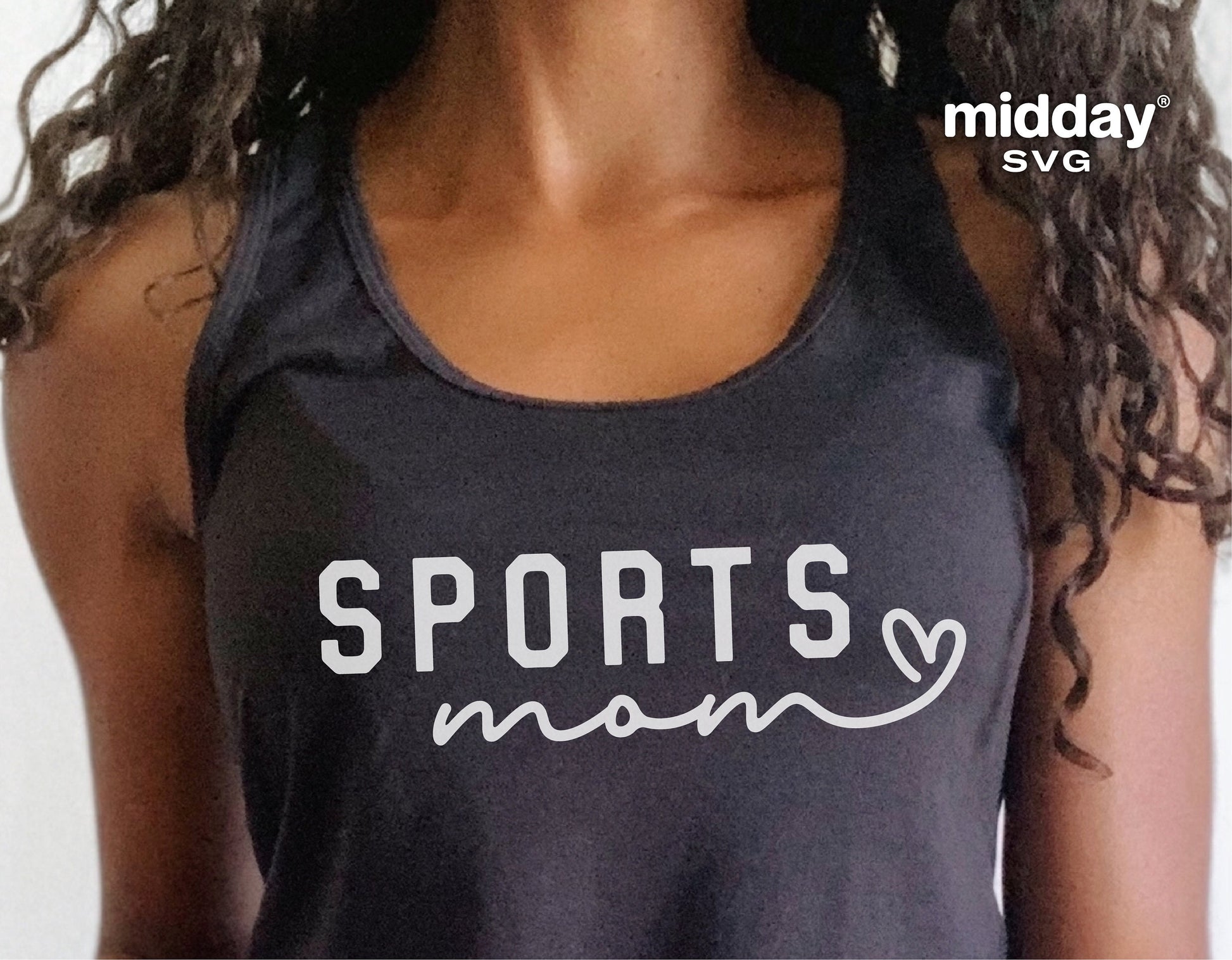 Woman wearing a sports mom tank top with 'Sports Mom' text, suitable for sports enthusiasts. Perfect for Cricut and Silhouette projects.
