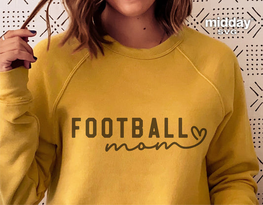 Yellow sweatshirt with 'Football Mom' design, perfect for Cricut and sublimation projects.