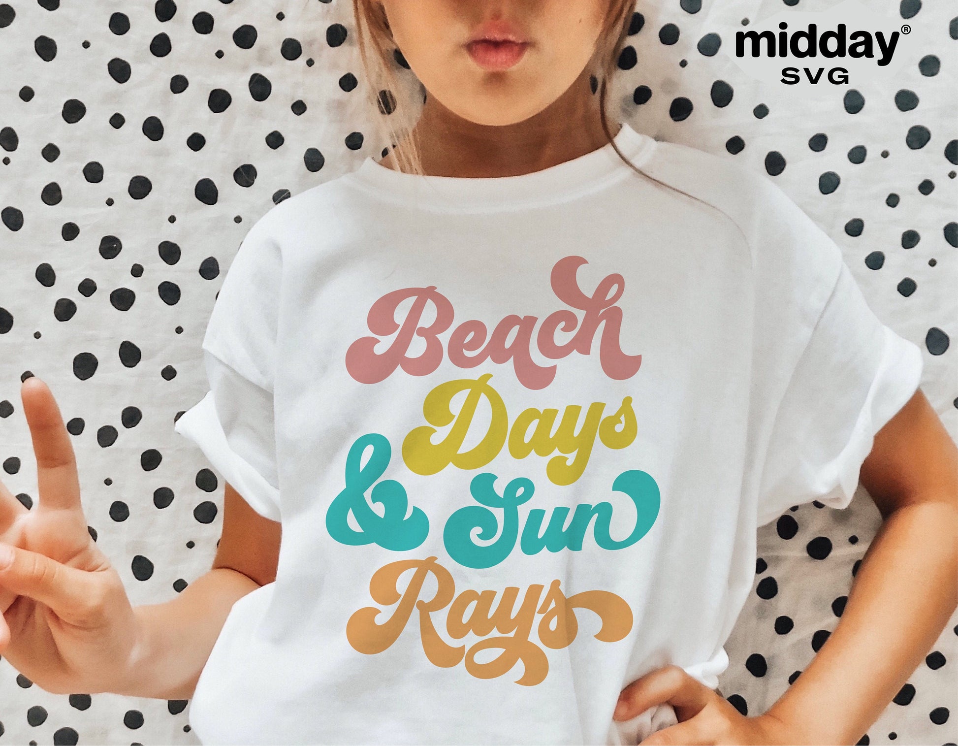 Girl wearing a t-shirt with 'Beach Days and Sun Rays' design in colorful letters, suitable for Cricut and Silhouette cut files.