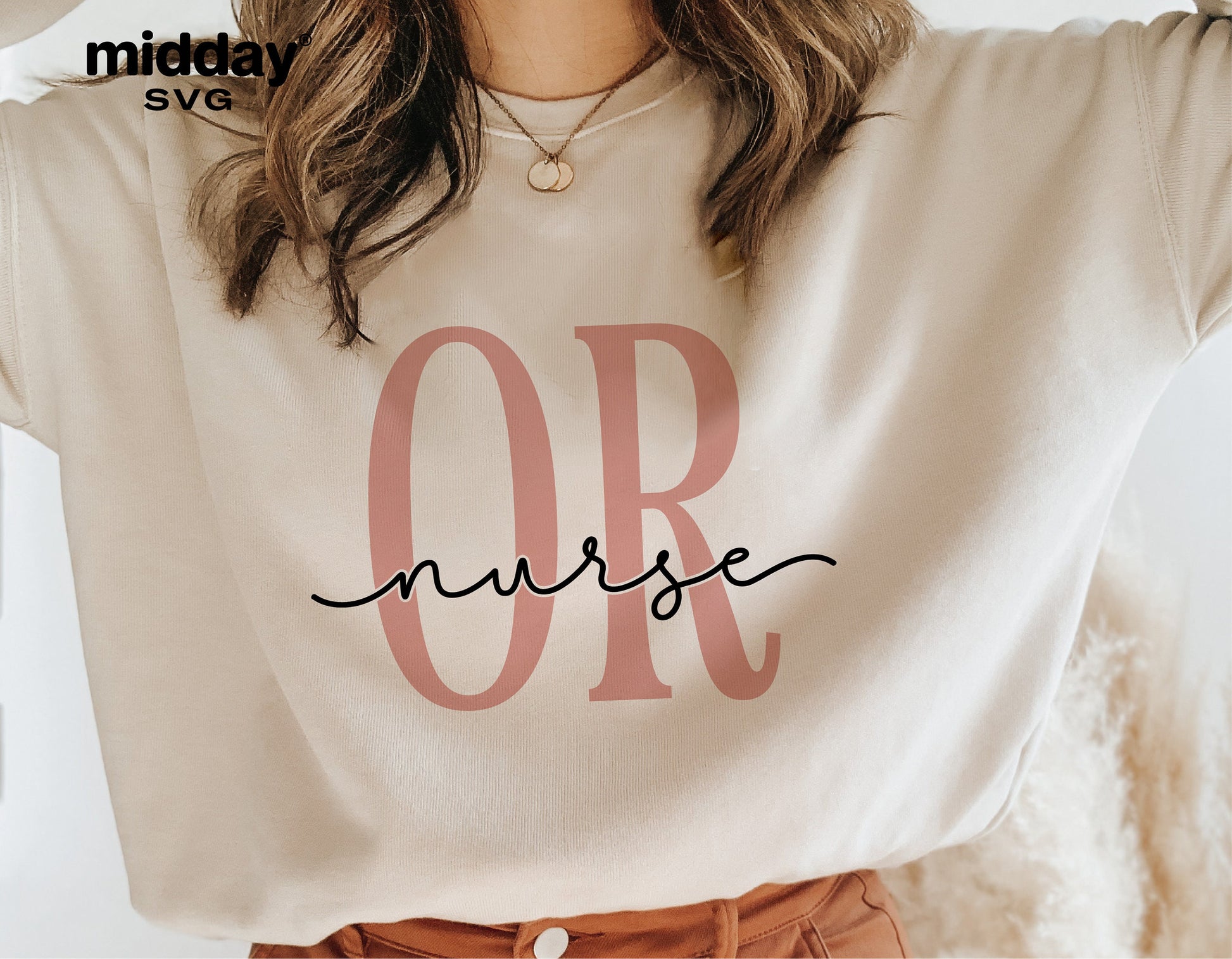 Woman wearing OR nurse shirt with stylish script lettering, perfect for cutting files, Cricut, Silhouette, or sublimation projects.