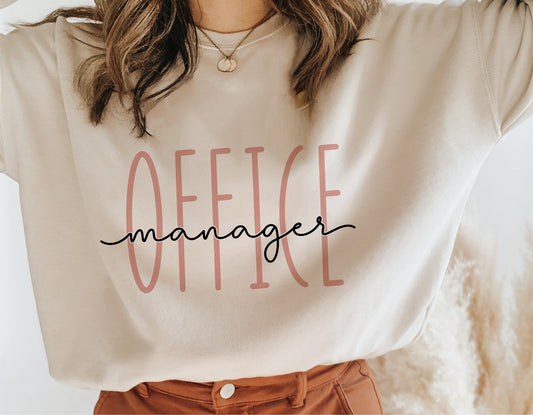 Woman wearing 'Office Manager' shirt, ideal for Cricut or Silhouette crafts, featuring stylish design for office professionals.