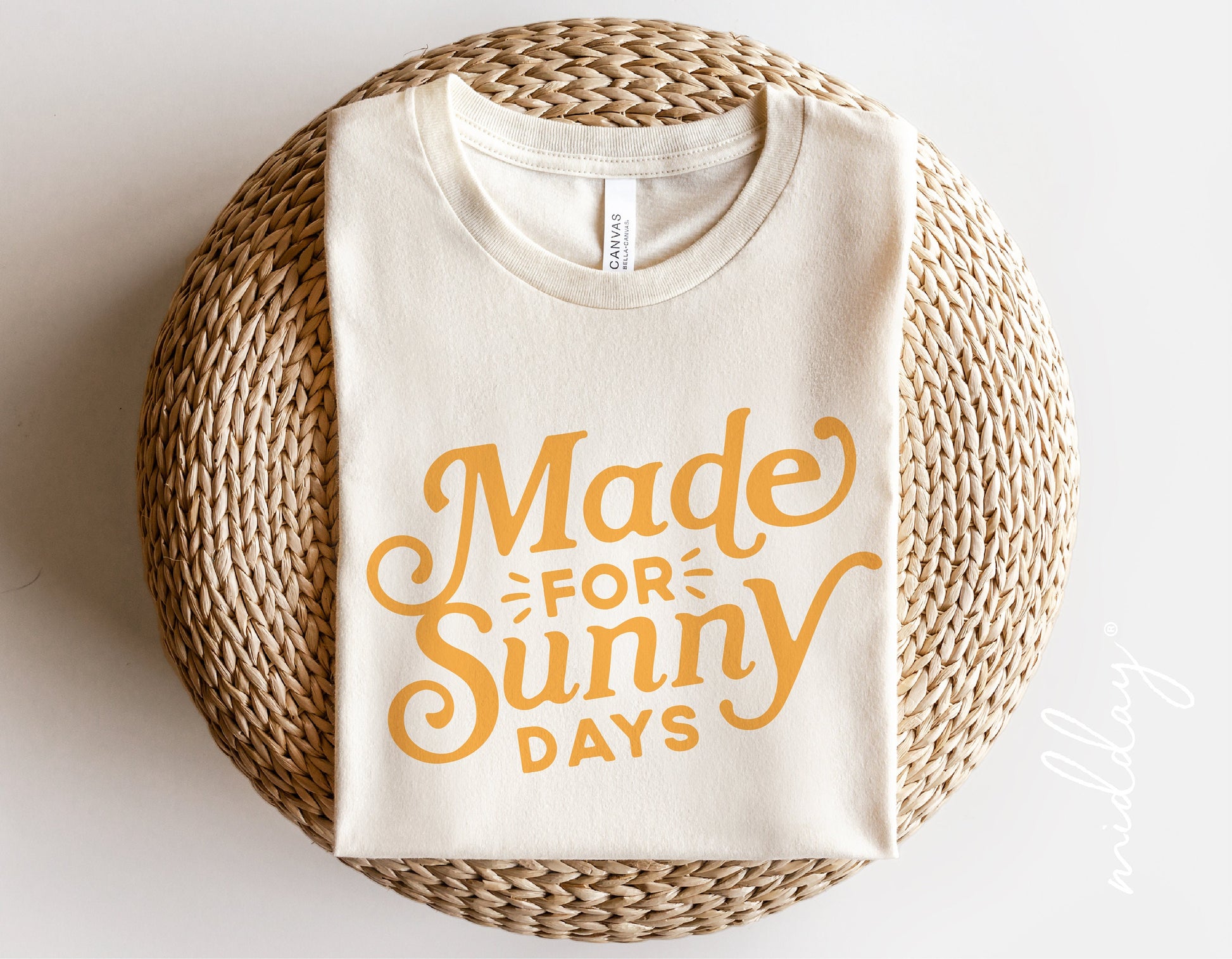 Beige t-shirt with 'Made For Sunny Days' text in yellow, perfect for summer outfits and beachwear.