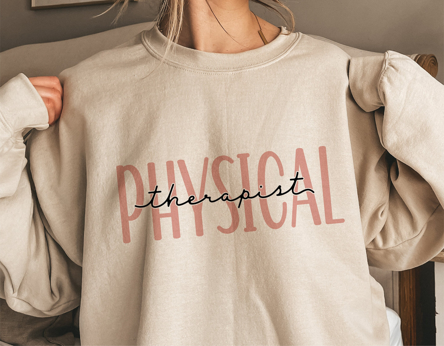 Beige sweatshirt with 'Physical Therapist' design, ideal for Cricut and Silhouette projects, perfect for creating custom apparel.