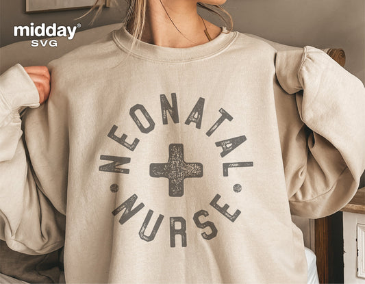 Beige sweatshirt with 'Neonatal Nurse' text and cross design, ideal for medical professionals, stylish casual wear for healthcare workers.