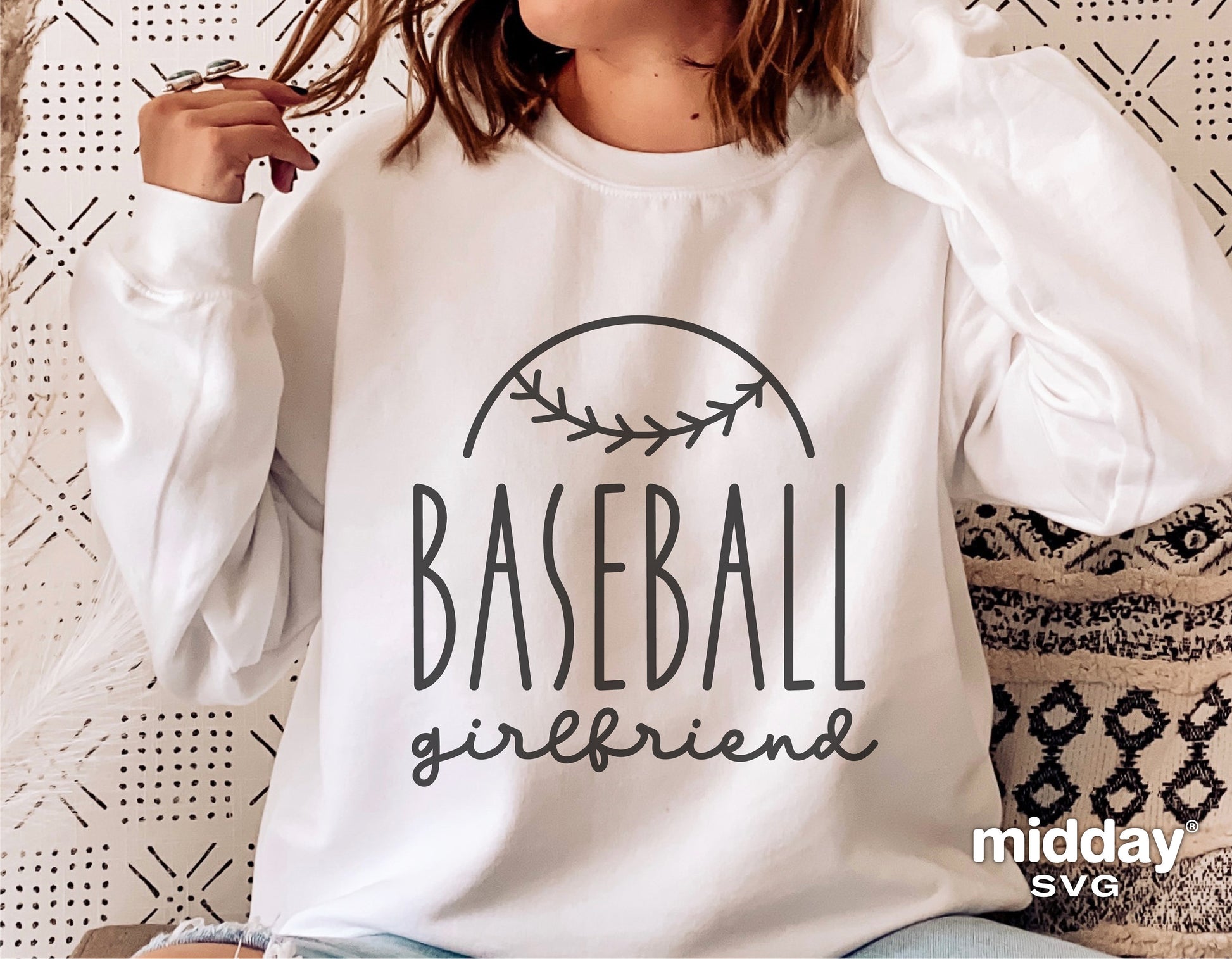 White sweatshirt with 'Baseball Girlfriend' design, perfect for Cricut and Silhouette crafting, ideal for creating gifts for baseball fans.