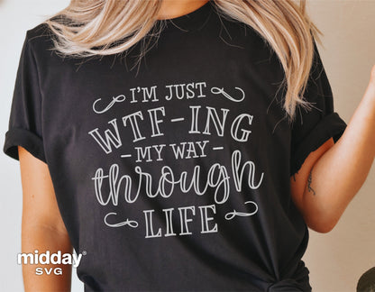 Woman wearing black t-shirt with 'I'm Just WTF-ing My Way Through Life' sarcastic quote, funny cut file for Cricut and Silhouette.