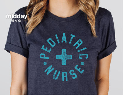 Woman wearing a navy blue t-shirt with 'Pediatric Nurse' text and cross graphic, design for nurse shirts, badge reels, Cricut cut files.