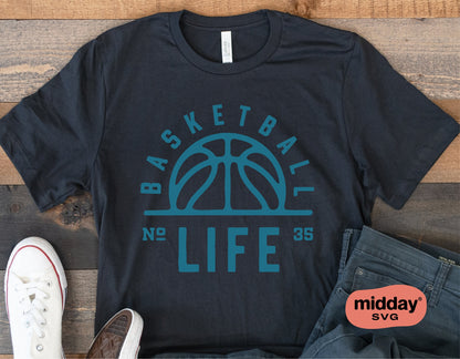 Black t-shirt with 'Basketball Life' design, featuring a sun-like basketball graphic and text mimicking sun's rays, ideal for sports fans.