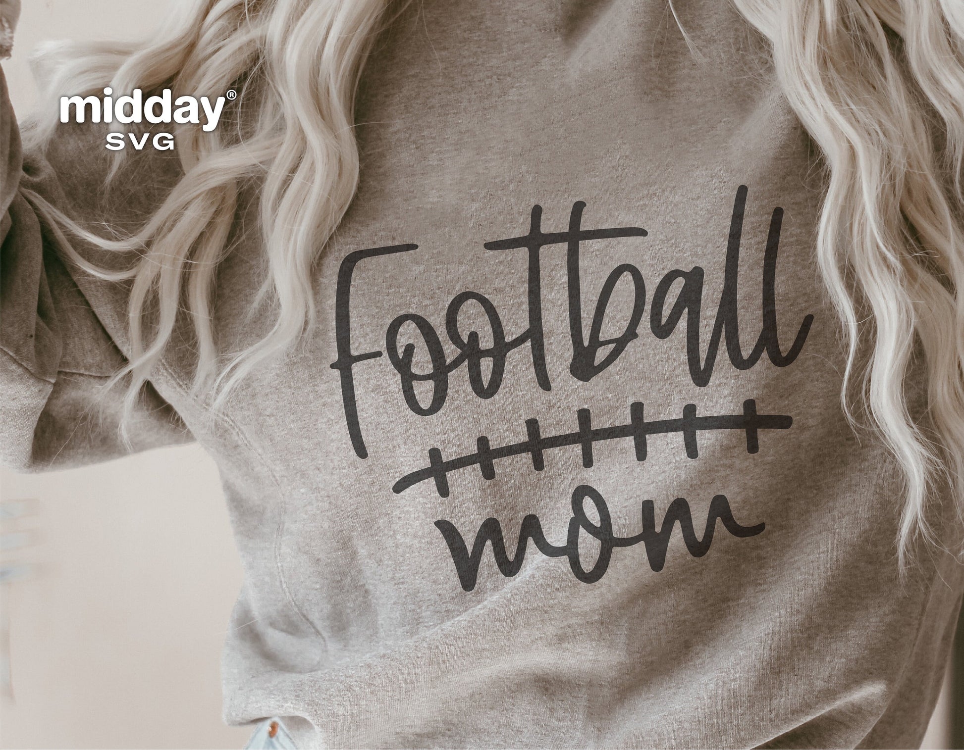 Gray sweatshirt with 'Football Mom' design, perfect for Cricut cutting and sublimation projects.