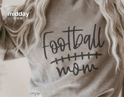 Gray sweatshirt with 'Football Mom' design, perfect for Cricut cutting and sublimation projects.