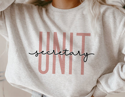 Unit Secretary sweatshirt with stylish script design, perfect for hospital staff appreciation and casual fashion.