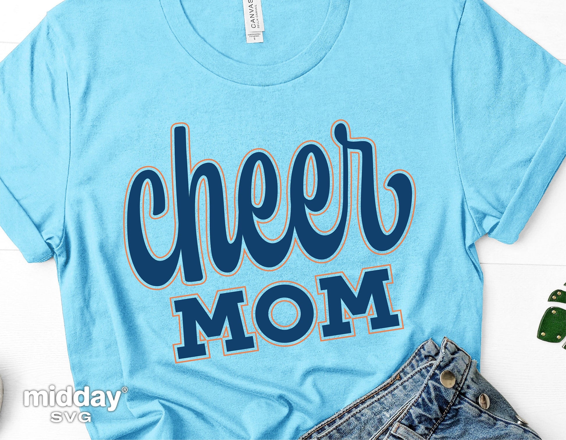 Light blue t-shirt with 'Cheer Mom' design for Cricut and Silhouette crafting projects.
