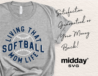 Gray t-shirt with 'Living That Softball Mom Life' design, promoting satisfaction guarantee by midday SVG.