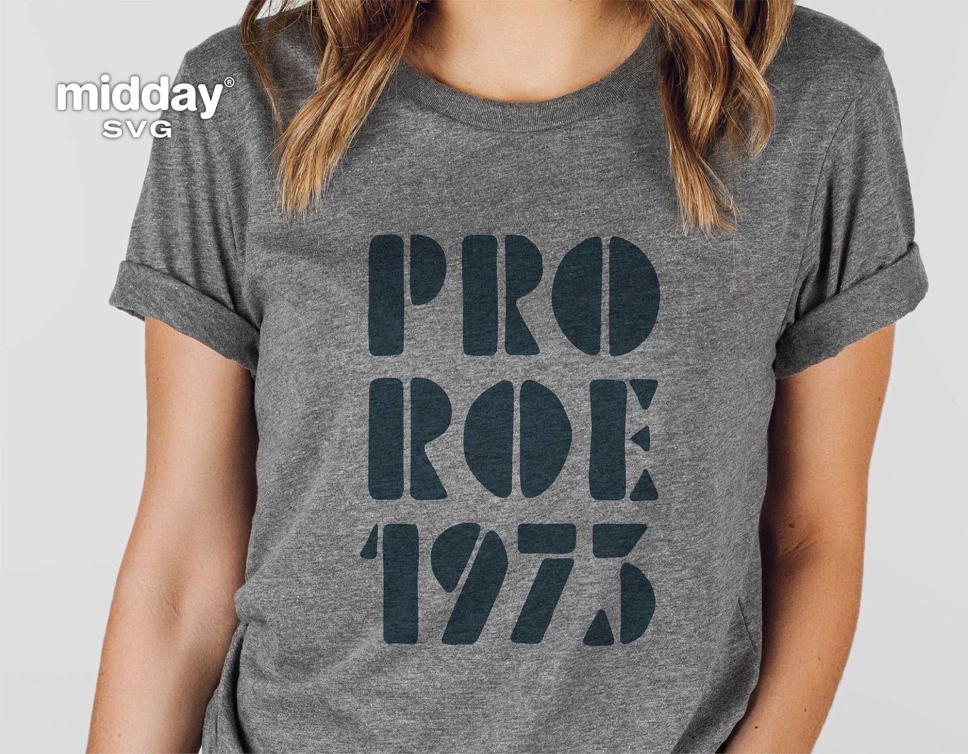 Woman wearing a shirt with 'Pro Roe 1973' design, supporting women's rights and Roe v Wade, suitable for Cricut and Silhouette projects.