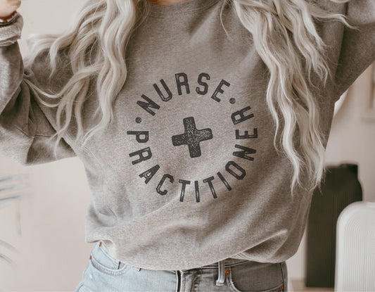 Gray sweatshirt featuring a Nurse Practitioner decal for mugs, shirts, and stickers, ideal for Cricut and Silhouette projects.