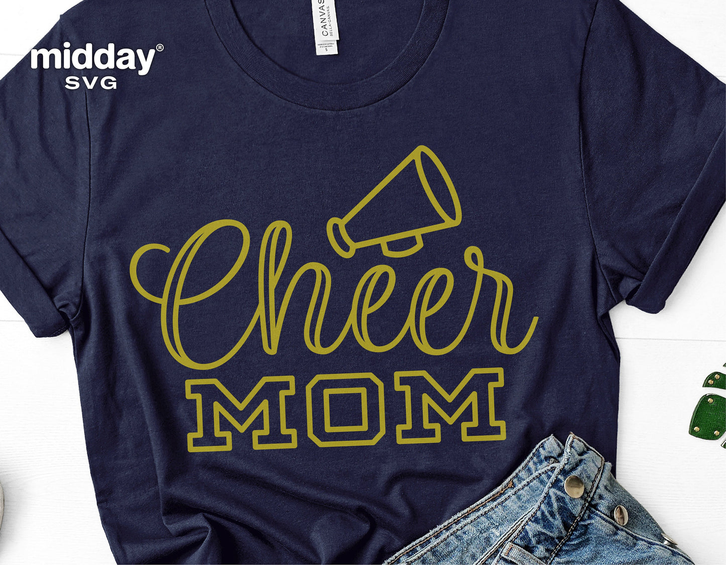 Cheer Mom SVG design on a navy blue t-shirt with megaphone graphic, ideal for Cricut and Silhouette projects, sublimation, and apparel.