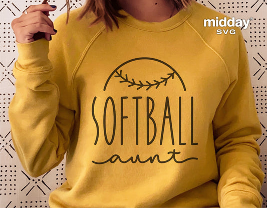 Woman wearing yellow sweatshirt with 'Softball Aunt' design, perfect for SVG, Cricut, and Silhouette projects.