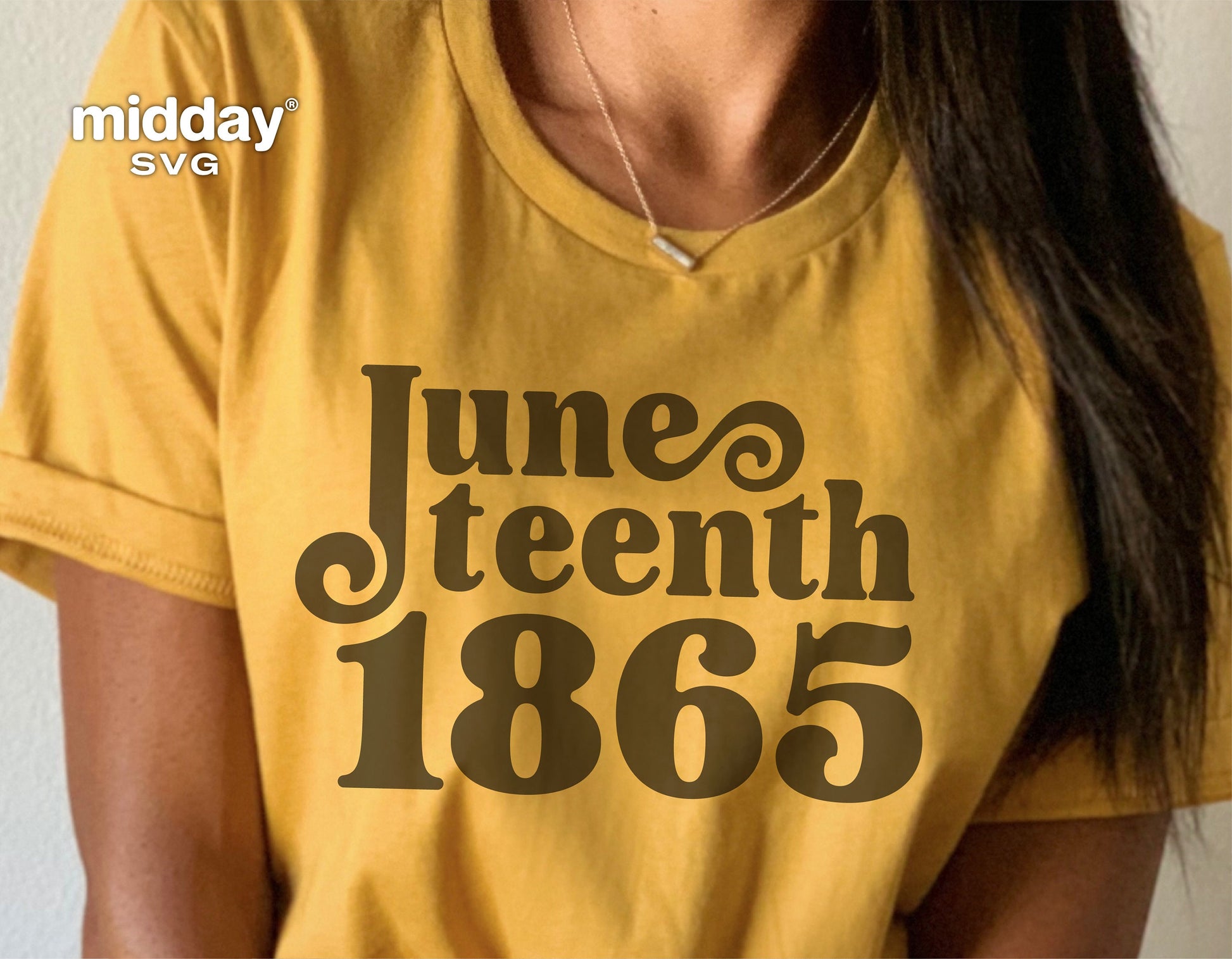 Person wearing a yellow t-shirt with 'Juneteenth 1865' design, symbolizing freedom and independence for Juneteenth celebrations.