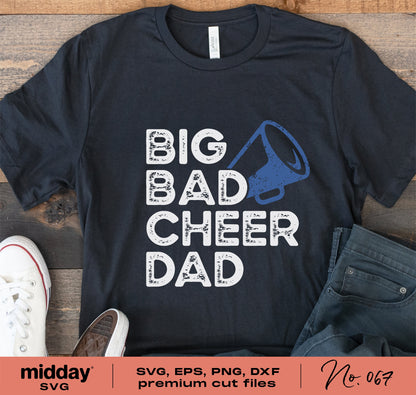Black t-shirt with 'Big Bad Cheer Dad' design, featuring blue megaphone graphic, surrounded by white sneakers and jeans for a casual look.