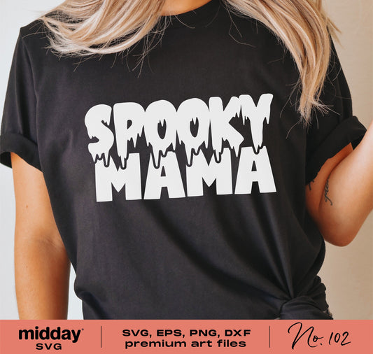 Woman wearing black t-shirt with 'Spooky Mama' text; perfect Halloween gift for stylish moms; ideal for Cricut crafting.