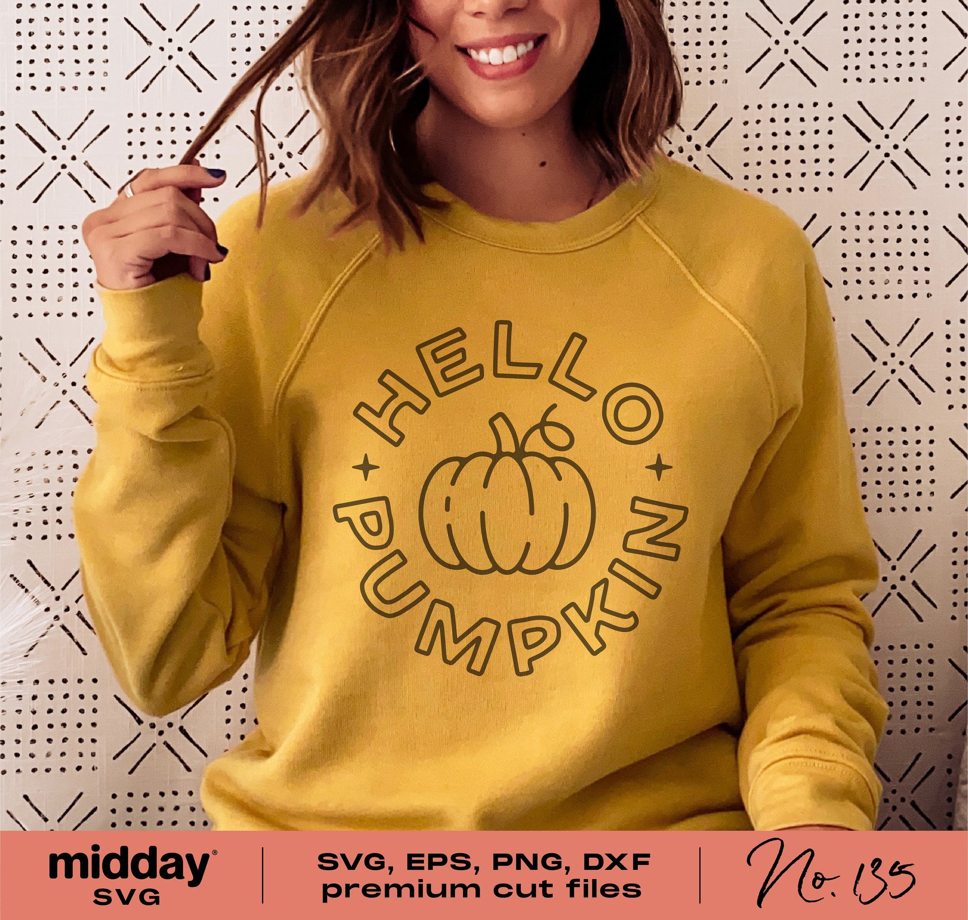 Woman wearing yellow sweatshirt with 'Hello Pumpkin' autumn design, ideal for Cricut and Silhouette cut files, perfect for fall fashion.