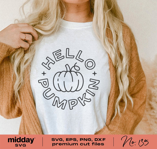 Woman wearing 'Hello Pumpkin' fall shirt design, available as SVG, PNG, DXF, EPS for Cricut and Silhouette, perfect for autumn and Halloween.