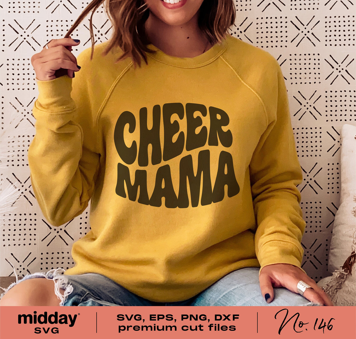 Person wearing yellow sweatshirt with 'Cheer Mama' retro letter design, showcasing SVG, PNG, DXF, EPS for Cricut and Silhouette use.