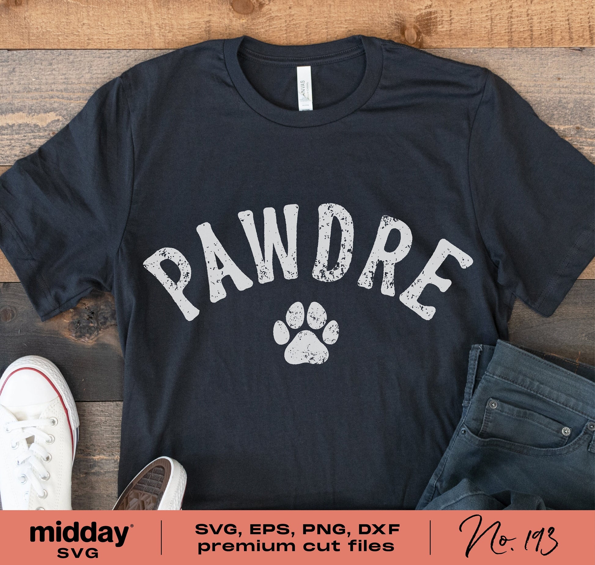Black 'Pawdre' t-shirt for dog lovers, ideal for Cricut and Silhouette crafting projects, surrounded by sneakers and jeans.