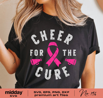 Woman wearing 'Cheer for the Cure' breast cancer awareness shirt with pink ribbon and cheerleading design.
