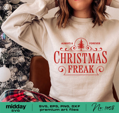 Person wearing a 'Christmas Freak' shirt with festive design, next to a decorated Christmas tree, perfect for crafting projects.