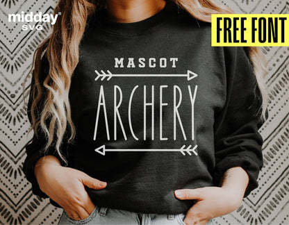 Woman wearing a black shirt with 'Mascot Archery' design, perfect for archery enthusiasts, available with free font and SVG files.
