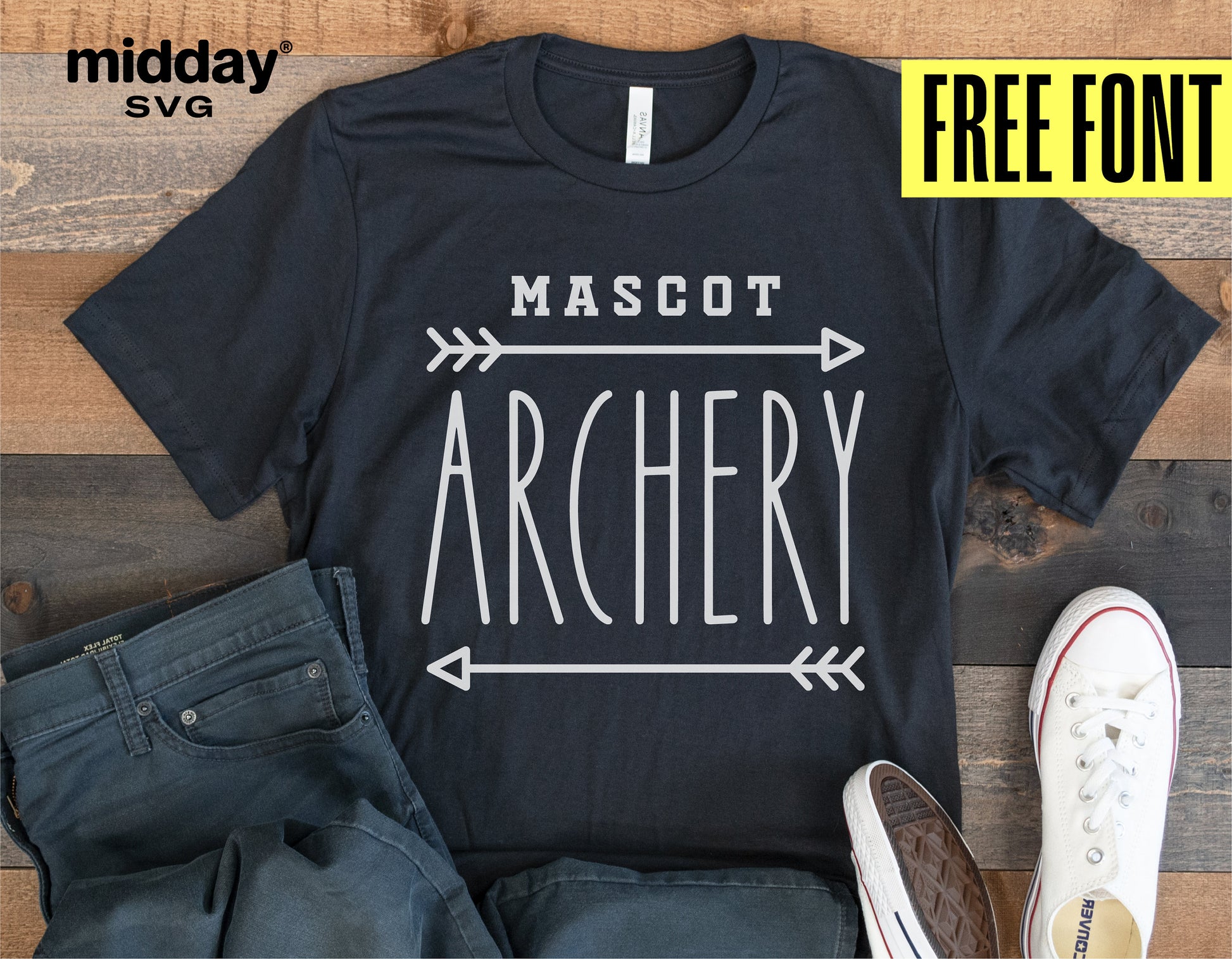 Black t-shirt with 'Mascot Archery' design, displayed with jeans and sneakers, featuring free font offer by Midday SVG.