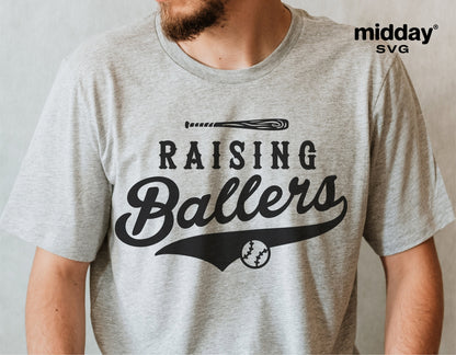 Man wearing 'Raising Ballers' baseball-themed graphic tee in gray color.